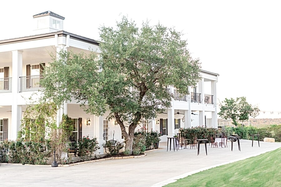 Kendall Point San Antonio wedding venue with cocktail tables set up.