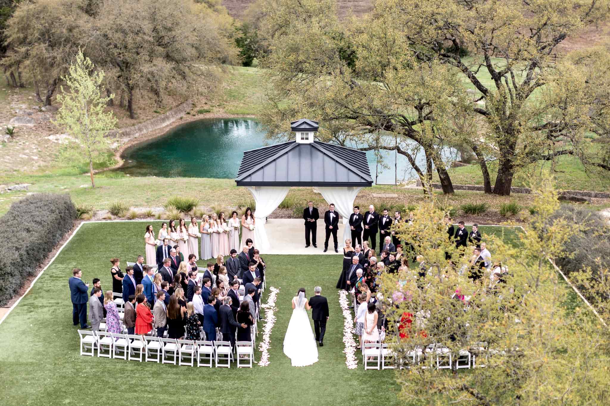 Aerial view of outdoor wedding ceremony at the Kendall Point gazebo