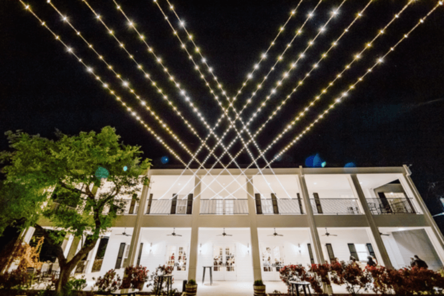 String lights over the back patio at Kendall Point