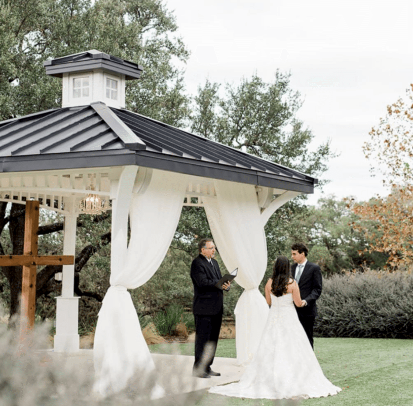 Wedding officiant performing ceremony at Kendall Point