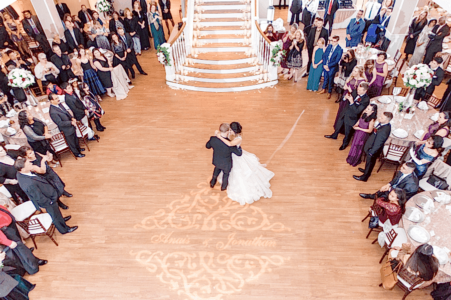 Overhead view of bride and groom's first dance in Kendall Point ballroom.