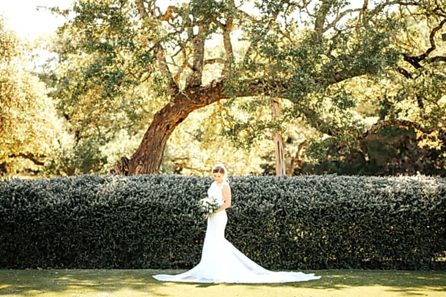 Kendall Point bride posting on the grounds.