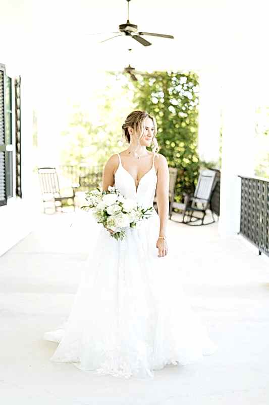 Bride standing on Kendall Point veranda