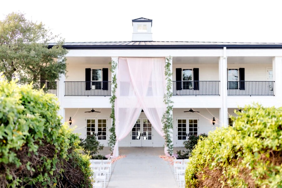 An outdoor wedding ceremony setup on the Kendall Point patio.