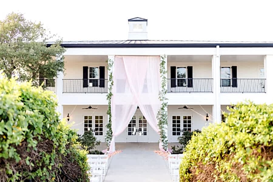 Kendall Point patio set up for outdoor ceremony on the bottom porch.