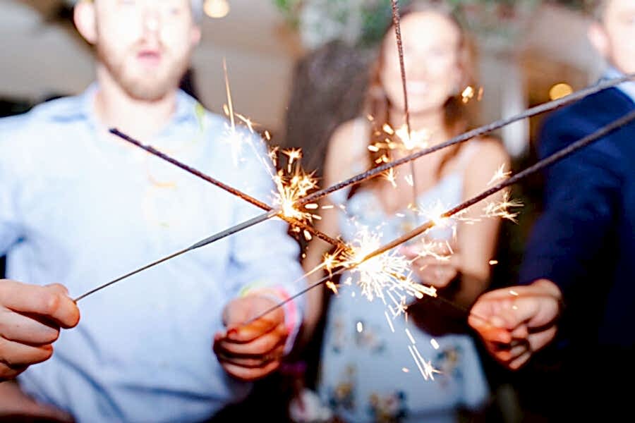 Friends and family sent Heather and Robert off with a display of sparklers once the sun had set and Texas heat had waned.
