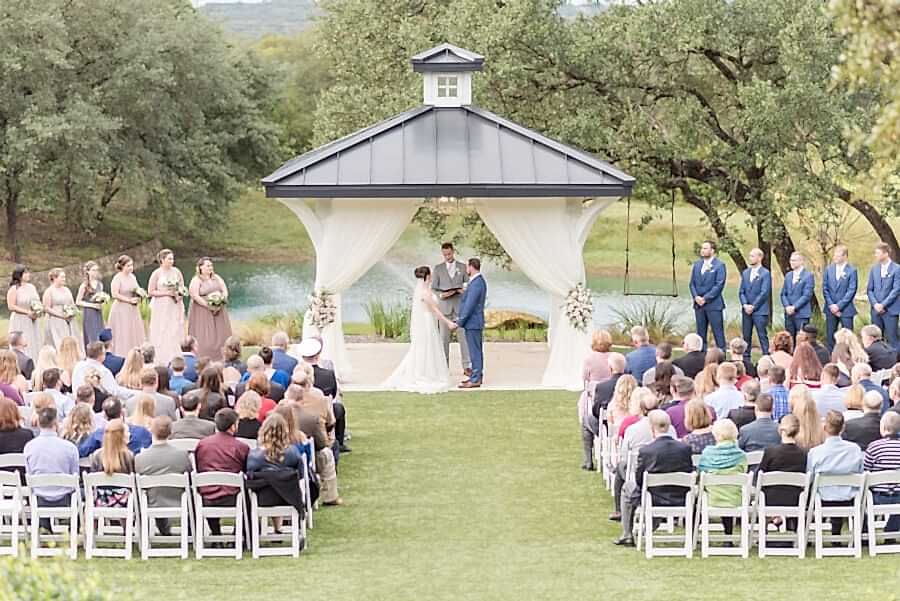 An outdoor wedding ceremony under the Kendall Point gazebo.