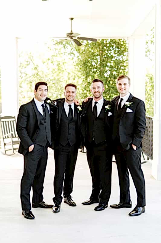 Groom and his groomsmen on Kendall Point veranda