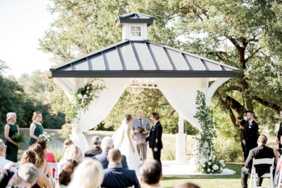 Wedding ceremony held in the outdoor gazebo.