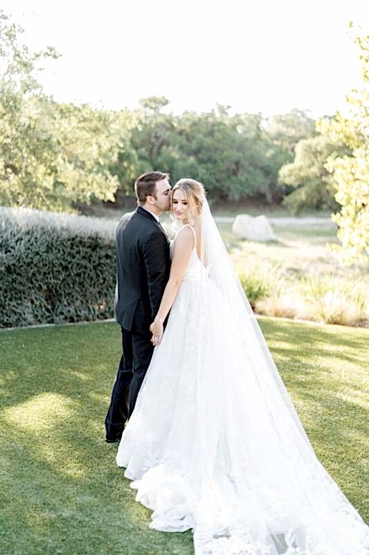 Bride and groom pose after Kendall Point wedding