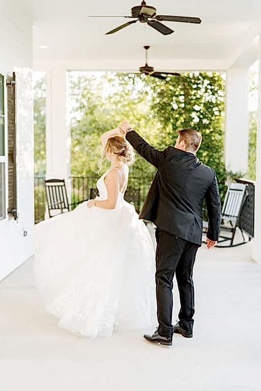 Bride and groom dance on Kendall Point veranda