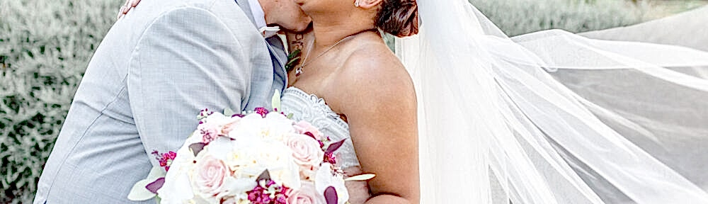 The bride and groom embrace.