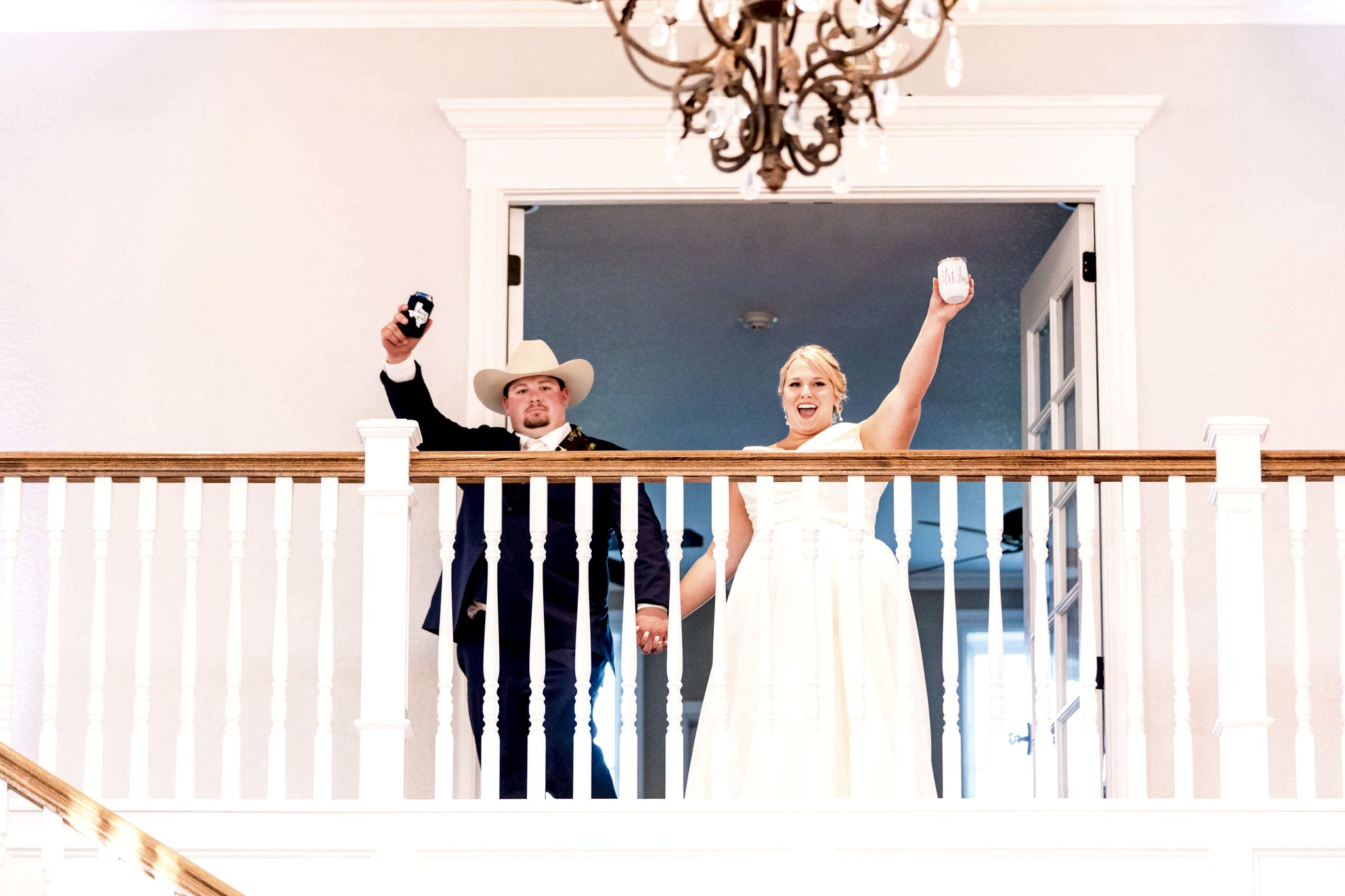 Bride and groom raise a glass to kick off the wedding reception!