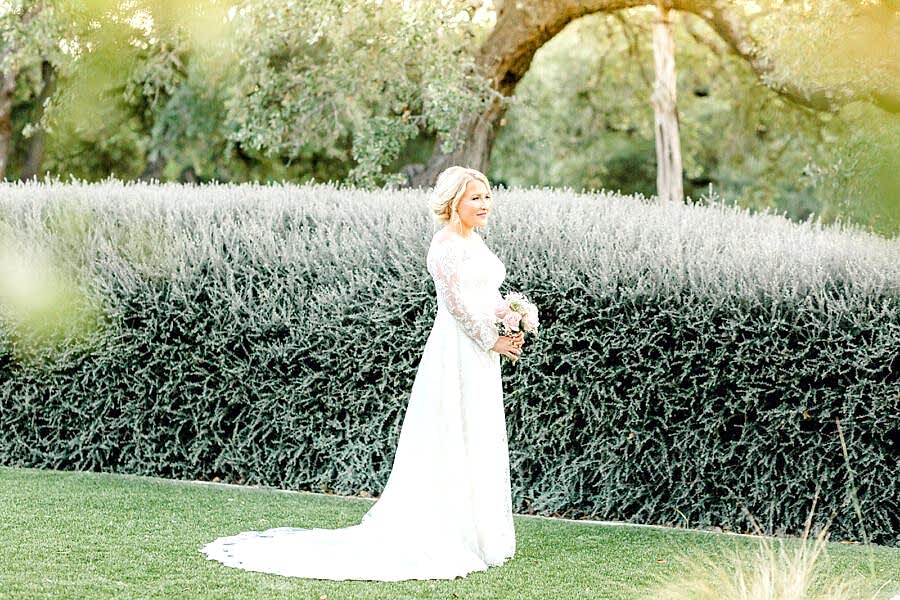 Bride standing on Kendall Point grounds