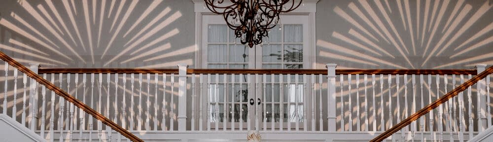 A classic chandelier hanging in the Kendall Point ballroom.
