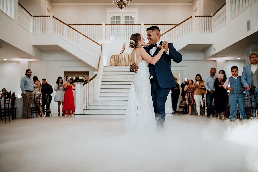 Bride and groom sharing their first dance during their wedding reception at Kendall Point.