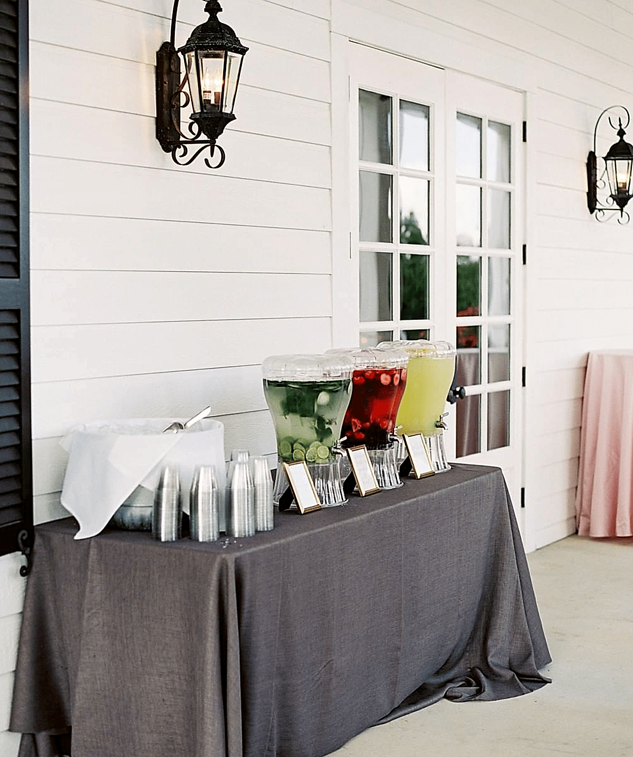 A table featuring signature drinks for a wedding.