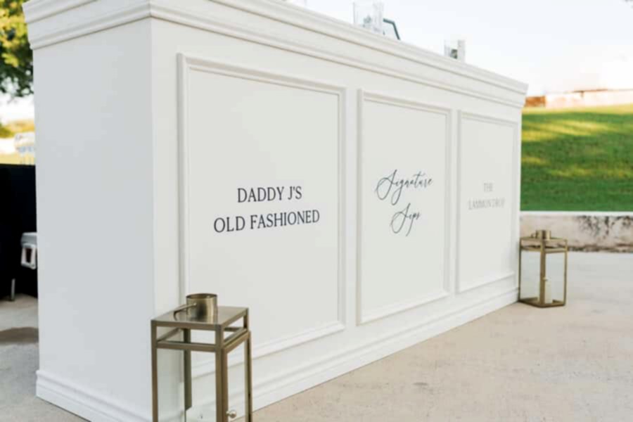 Wedding bar with signature drinks printed on the front