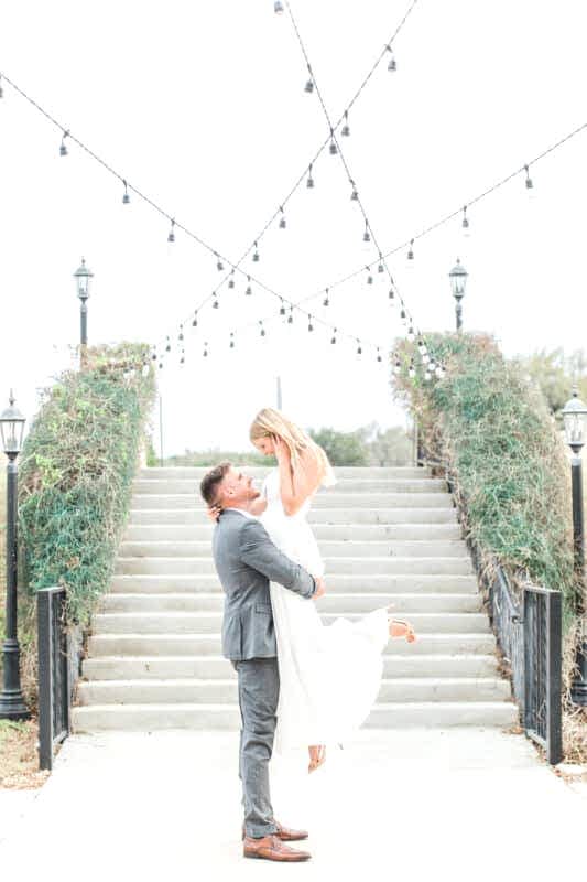 Couple taking engagement photos at Kendall Point