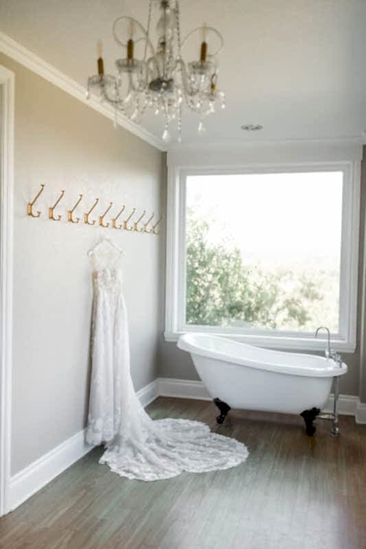 Wedding gown hanging in Kendall Point bridal suite.