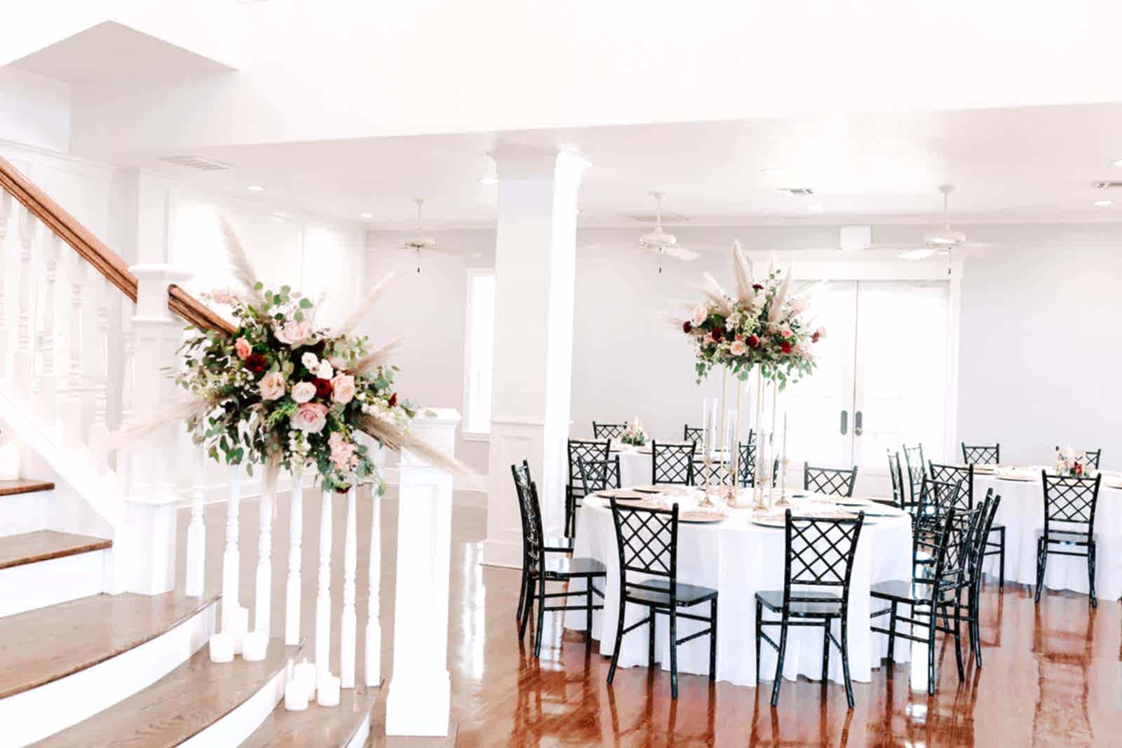 wedding reception setup with minimal floral arrangements