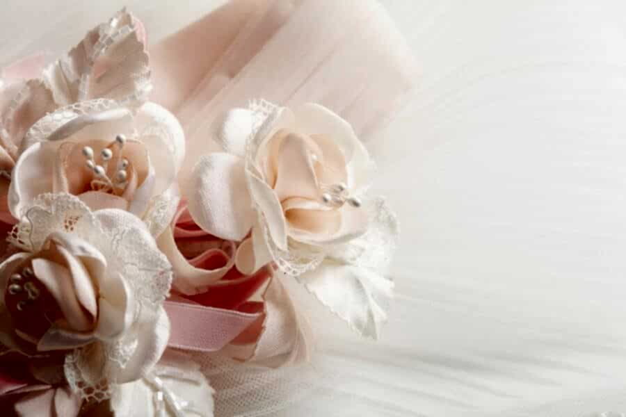 Pink and white bouquet with lace for a wedding